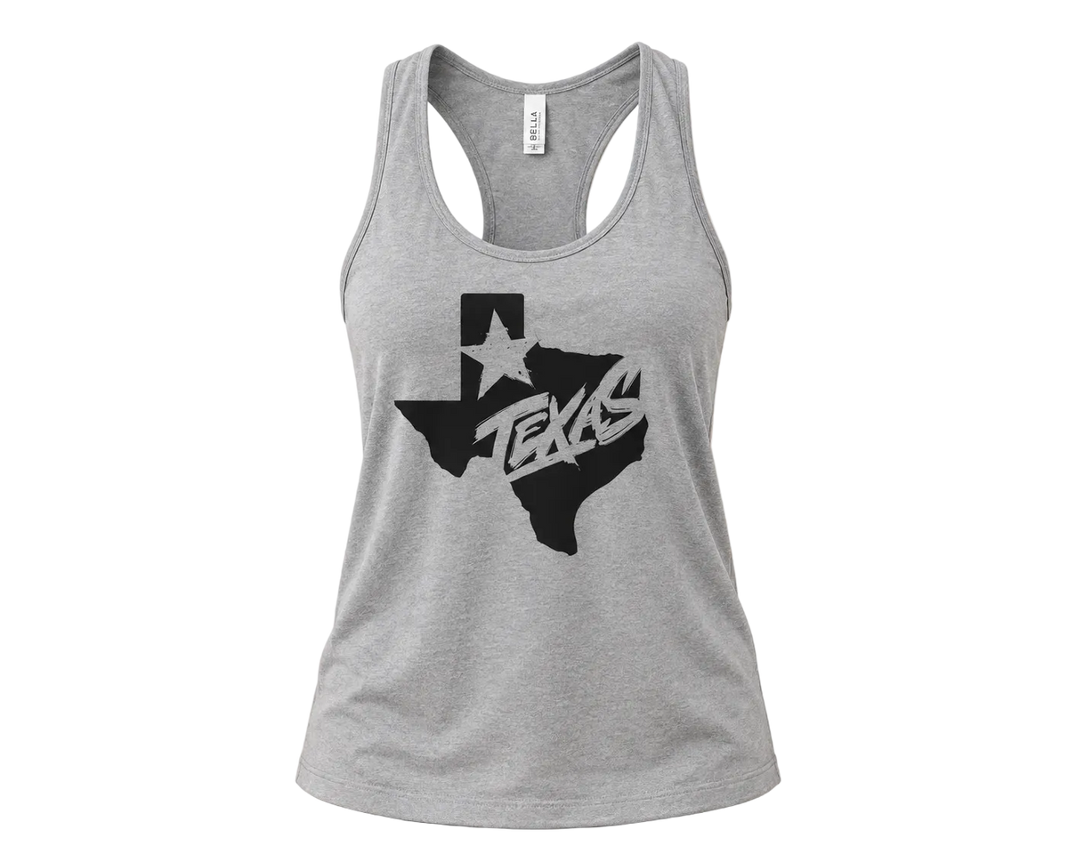 A heather gray racerback tank top featuring a black graphic of the state of Texas with a white star and the word 'TEXAS' in stylized lettering, displayed against a solid beige background.